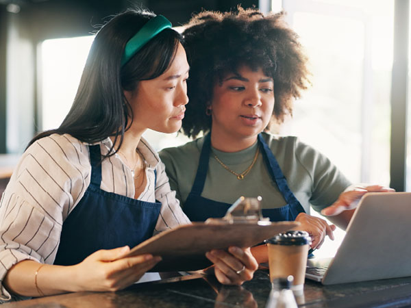 women looking at computer